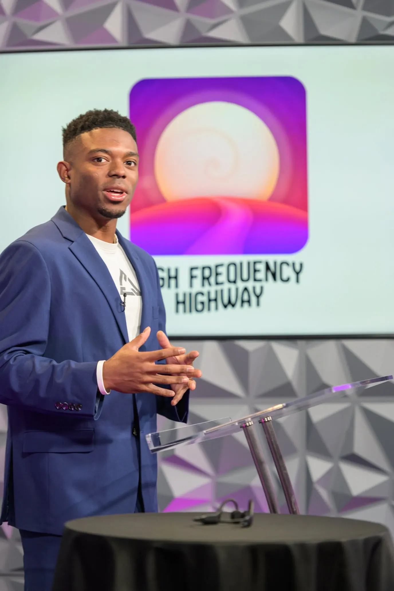 J Johnson Jr. presenting High Frequency Highway on stage