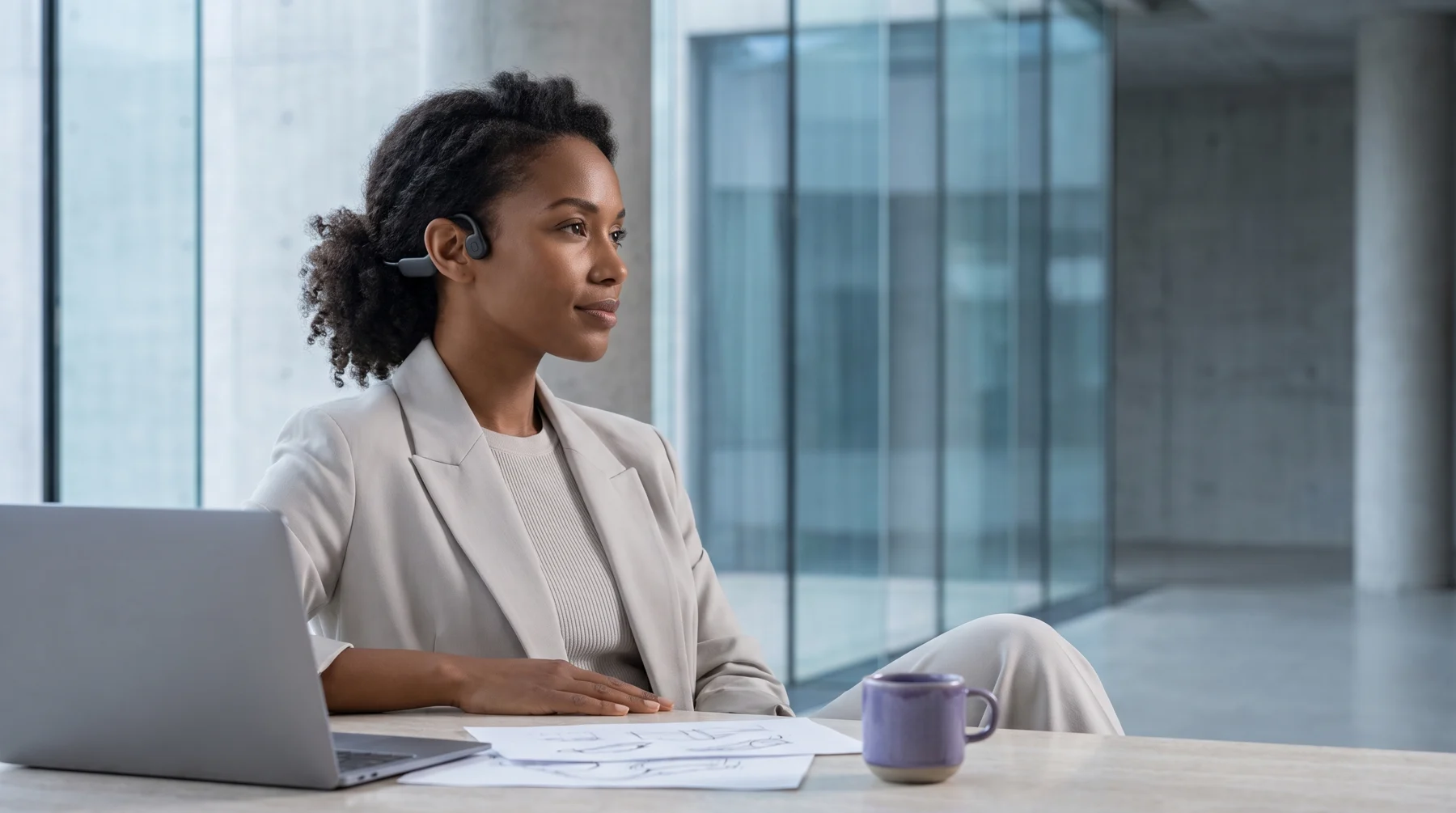 A woman listening while working